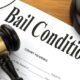 Bail Reduced for Co-Owner of Funeral Home