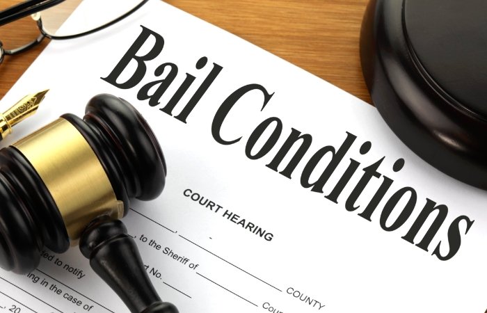 Bail Reduced for Co-Owner of Funeral Home