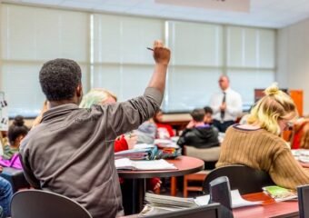 Grand Junction High School students studying
