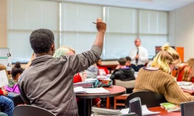 Grand Junction High School students studying