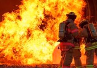Firefighters battling flames