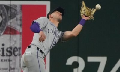 Nolan Jones fielding error Cubs game