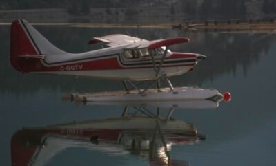 “seaplane flying over Alaskan wilderness”