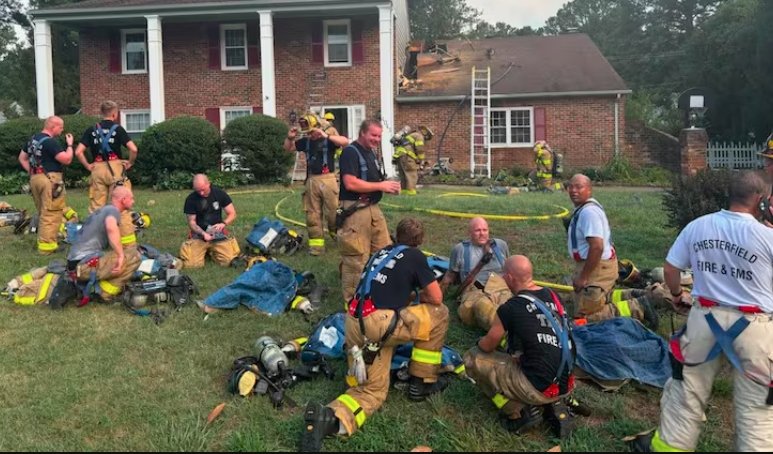 firefighters battling house fire in extreme heat