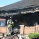 man sets house on fire and barricades himself inside in west indy