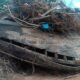 Ancient shipwreck discovery ceramic plates underwater