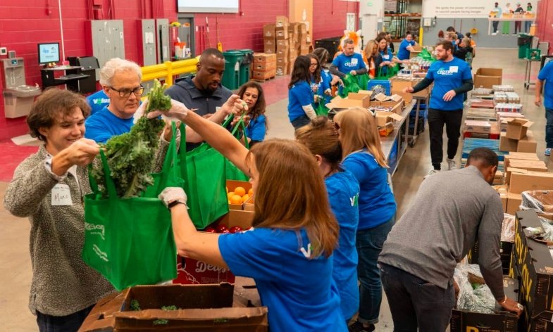 Food Bank of the Rockies volunteers packing food for community