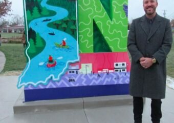 Woodburn I Am Allen sculpture ribbon cutting ceremony