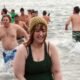 Participants taking the plunge into icy waters during the Polar Bear Club Swim