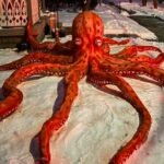 Central Indiana’s Snow Artist Unveils Massive Octopus Sculpture After Latest Snowstorm