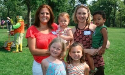 Adoptive family with children at park