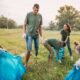 community volunteers picking up trash in a park