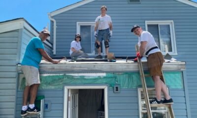 volunteers repairing building roof in Colorado
