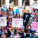 women's rights march downtown protest signs