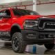 red dodge ram truck with airbag deployment damage