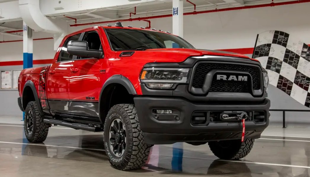 red dodge ram truck with airbag deployment damage
