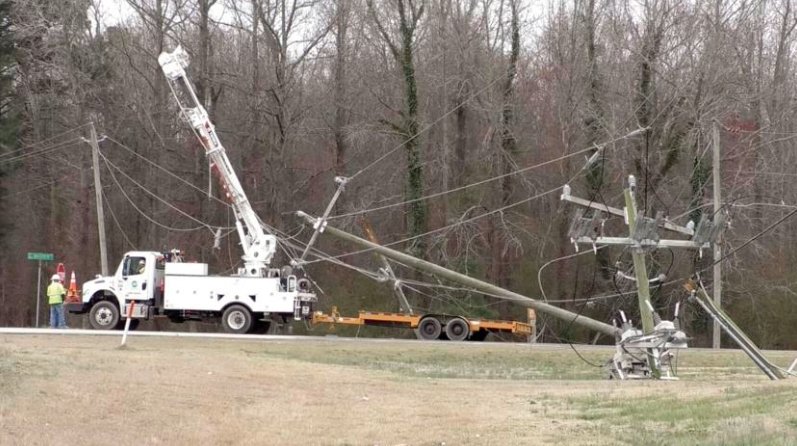 dump truck crash utility pole Grand Junction