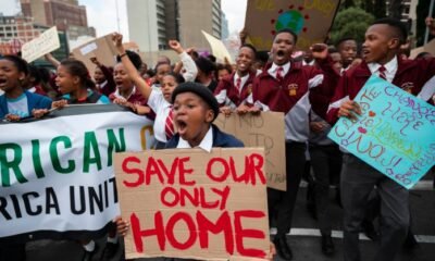 protesters rally