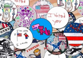 kids designing voting stickers
