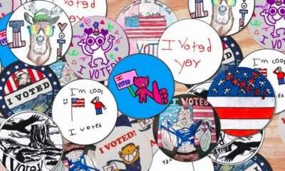 kids designing voting stickers