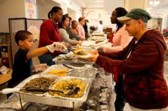 Hundreds Flock to St. Mary's Soup Kitchen Thanksgiving Meal