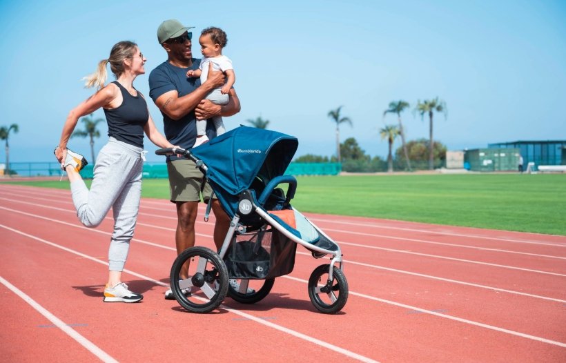runner pushing stroller