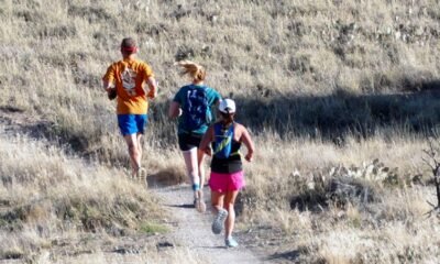 runners on river trail Grand Junction
