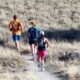 runners on river trail Grand Junction
