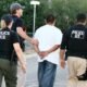 Case Background and Initial Arrests