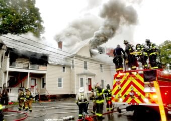 Firefighters Battle Northeast House Blaze