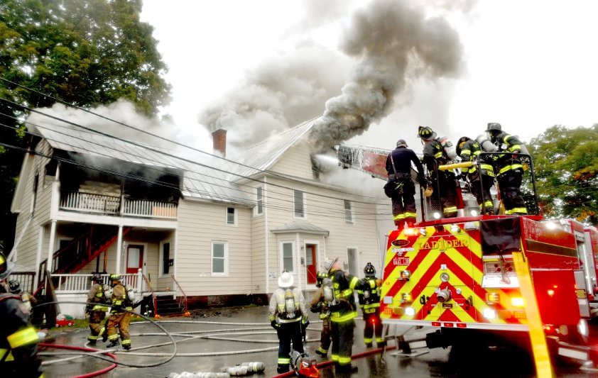 Firefighters Battle Northeast House Blaze