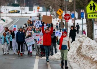 Protesters March Against ICE Shooting