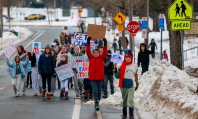 Protesters March Against ICE Shooting