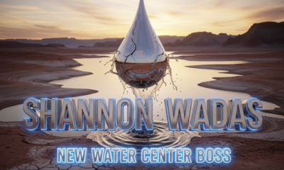 A viral, hyper-realistic YouTube thumbnail with a dramatic Western water crisis atmosphere. The background is a vast cracked dry lake bed of Lake Powell at sunset with deep orange skies and distant red rock cliffs, low water levels exposing white bathtub rings. The composition uses a dramatic low-angle shot looking up to focus on the main subject: a massive polished chrome water droplet suspended in mid-air, dramatically cracking under pressure. The image features massive 3D typography with strict hierarchy: The Primary Text reads exactly: 'Shannon Wadas'. This text is massive, the largest element in the frame, rendered in liquid mercury chrome with rippling water reflections to look like a high-budget 3D render. The Secondary Text reads exactly: 'New Water Center Boss'. This text is significantly smaller, positioned below the main text with a thick electric-blue glowing outline and subtle splash effects to contrast against the arid background. The text materials correspond to the story's concept. Crucial Instruction: There is absolutely NO other text, numbers, watermarks, or subtitles in this image other than these two specific lines. 8k, Unreal Engine 5, cinematic render
