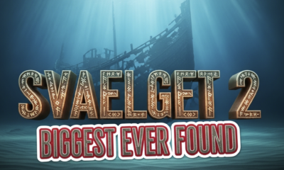 A viral, hyper-realistic YouTube thumbnail with a mysterious deep-sea archaeological atmosphere. The background is a dark, moody Øresund seabed with shafts of blue-green light cutting through murky water and fine sand swirling gently. The composition uses a dramatic low-angle shot looking up to focus on the main subject: a massive, ghostly medieval cog shipwreck emerging from the sand, timbers perfectly preserved after 600 years. The image features massive 3D typography with strict hierarchy: The Primary Text reads exactly: 'SVAELGET 2'. This text is massive, the largest element in the frame, rendered in ancient weathered bronze with glowing runes effect to look like a high-budget 3D render. The Secondary Text reads exactly: 'BIGGEST EVER FOUND'. This text is significantly smaller, positioned below the main text with a thick crimson blood-red outline in sticker style to contrast against the deep blue background. Make sure text 2 has completely different style and effect from text 1. Crucial Instruction: There is absolutely NO other text, numbers, watermarks, or subtitles in this image other than these two specific lines. 8k, Unreal Engine 5, cinematic render