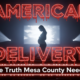 A viral, hyper-realistic YouTube thumbnail with a dramatic cinematic documentary atmosphere. The background is a dark intimate theater in Grand Junction with soft red seat glows and subtle projector light beams cutting through haze. The composition uses a low-angle shot to focus on the main subject: a large glowing movie screen showing a silhouette of a pregnant woman in distress holding her belly. The image features massive 3D typography with strict hierarchy: The Primary Text reads exactly: 'AMERICAN DELIVERY'. This text is massive, the largest element in the frame, rendered in cracked blood-red neon glass with dripping liquid effect to look like a high-budget horror-drama render. The Secondary Text reads exactly: 'The Truth Mesa County Needed'. This text is significantly smaller, positioned below the main text. It features a thick white outline with pulsing emergency-red glow border to contrast against the dark background. The text materials correspond to the story's concept. Crucial Instruction: There is absolutely NO other text, numbers, watermarks, or subtitles in this image other than these two specific lines. 8k, Unreal Engine 5, cinematic render.