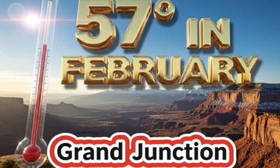 A viral, hyper-realistic YouTube thumbnail with a bright sunny winter atmosphere. The background is a sweeping panoramic view of the Grand Valley and Colorado National Monument under a brilliant blue sky with scattered dramatic clouds at sunrise, warm golden light bathing red rock canyons and the snow-capped Book Cliffs in the distance with subtle lens flare. The composition uses a dramatic low-angle wide shot to focus on the main subject: a large, freestanding outdoor thermometer showing 57 degrees. The image features massive 3D typography with strict hierarchy: The Primary Text reads exactly: '57° IN FEBRUARY'. This text is massive, the largest element in the frame, rendered in molten chrome gold with realistic reflective shine to look like a high-budget 3D render. The Secondary Text reads exactly: 'Grand Junction'. This text is significantly smaller, positioned below the main text. It features a thick white border with red outline in bold sticker style to contrast against the bright sky. Make sure text 2 is always different theme, style, effect and border compared to text 1. The text materials correspond to the story's concept. Crucial Instruction: There is absolutely NO other text, numbers, watermarks, or subtitles in this image other than these two specific lines. 8k, Unreal Engine 5, cinematic render.