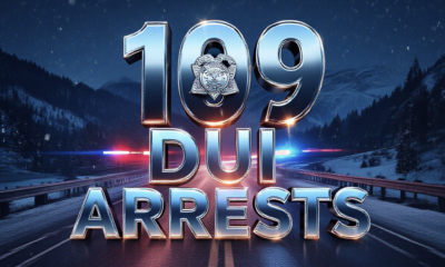 A viral, hyper-realistic YouTube thumbnail with a dramatic police enforcement atmosphere. The background is a dark Colorado mountain highway at night with flashing red and blue police lights cutting through falling snow. The composition uses a low-angle shot to focus on the main subject: a gleaming Colorado State Patrol badge floating in the foreground. The image features massive 3D typography with strict hierarchy: The Primary Text reads exactly: '109 DUI ARRESTS'. This text is massive, the largest element in the frame, rendered in molten police-blue chrome with glowing edges to look like a high-budget 3D render. The Secondary Text reads exactly: 'ZERO DEATHS'. This text is significantly smaller, positioned below the main text. It features a thick, bold white border with red outline sticker style to contrast against the dark background. The text materials correspond to the story's concept. Crucial Instruction: There is absolutely NO other text, numbers, watermarks, or subtitles in this image other than these two specific lines. 8k, Unreal Engine 5, cinematic render