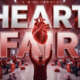 A viral, hyper-realistic YouTube thumbnail with a powerful red health awareness atmosphere. The background is a bustling hospital community hall filled with red-shirted attendees, screening stations, CPR mannequins, and sugar cube displays under dramatic red and white lighting. The composition uses a dynamic low-angle shot to focus on the main subject: a glowing anatomical heart model being held up triumphantly. The image features massive 3D typography with strict hierarchy: The Primary Text reads exactly: 'HEART FAIR'. This text is massive, the largest element in the frame, rendered in pulsing red chrome with realistic heartbeat glow effect to look like a high-budget 3D render. The Secondary Text reads exactly: 'FIGHTS #1 KILLER'. This text is significantly smaller, positioned below the main text with electric blue outline and subtle shockwave effect. The text materials correspond to the story's concept. Crucial Instruction: There is absolutely NO other text, numbers, watermarks, or subtitles in this image other than these two specific lines. 8k, Unreal Engine 5, cinematic render