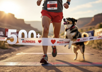 A viral, hyper-realistic YouTube thumbnail with a warm, romantic outdoor sports atmosphere.eabaground is the sun-lit Fruita Community Center finish line area with Colorado River bluffs in the distance and soft golden morning light. The composition uses a wide, slightly low angle to focus on the main subject: a pair of muddy running shoes mid-stride with a red heart-shaped race bib pinned to red shorts, a happy rescue dog leaping up for a kiss right at the finish line tape. The image features massive 3D typography with strict hierarchy: The Primary Text reads exactly: '500+ RUNNERS'. This text is massive, the largest element in the frame, rendered in polished chrome with red glowing edges to look like a high-budget 3D render. The Secondary Text reads exactly: 'SWEETHEART RUN RECORD'. This text is significantly smaller, positioned below the main text. It features a thick white sticker-style border with slight drop shadow to contrast against the background. Make sure text 2 is always different theme, style, effect and border compared to text 1. The text materials correspond to the story's concept. Crucial Instruction: There is absolutely NO other text, numbers, watermarks, or subtitles in this image other than these two specific lines. 8k, Unreal Engine 5, cinematic render.