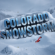 A viral, hyper-realistic YouTube thumbnail with a dramatic winter storm atmosphere. The background is a blinding whiteout blizzard raging across Colorado's San Juan Mountains with heavy snow blowing sideways. The composition uses a low-angle cinematic shot to focus on the main subject: a massive cracked avalanche warning sign buried halfway in deep snow. The image features massive 3D typography with strict hierarchy: The Primary Text reads exactly: 'COLORADO SNOWSTORM'. This text is massive, the largest element in the frame, rendered in icy blue chrome with frost and snow accumulation to look like a high-budget 3D render. The Secondary Text reads exactly: 'AVALANCHE WARNING!'. This text is significantly smaller, positioned below the main text. It features a thick, glowing red border/outline (sticker style) to contrast against the background. Make sure text 2 is always different theme, style, effect and border compared to text 1. The text materials correspond to the story's concept. Crucial Instruction: There is absolutely NO other text, numbers, watermarks, or subtitles in this image other than these two specific lines. 8k, Unreal Engine 5, cinematic render
