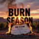 A viral, hyper-realistic YouTube thumbnail with a dramatic Western Colorado sunset atmosphere. The background is a vast Grand Valley landscape with orchards and red rock mesas glowing under golden hour light with subtle smoke trails rising in the distance. The composition uses a low dramatic angle to focus on the main subject: a large, weathered burn permit document dramatically burning at the edges while remaining perfectly legible. The image features massive 3D typography with strict hierarchy: The Primary Text reads exactly: 'BURN SEASON STARTS'. This text is massive, the largest element in the frame, rendered in molten orange chrome with glowing ember edges to look like a high-budget 3D render. The Secondary Text reads exactly: 'MARCH 1'. This text is significantly smaller, positioned below the main text with a thick white outline and red glow border to contrast against the smoky background. The text materials correspond to the story's concept. Crucial Instruction: There is absolutely NO other text, numbers, watermarks, or subtitles in this image other than these two specific lines. 8k, Unreal Engine 5, cinematic render