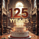 A viral, hyper-realistic YouTube thumbnail with a warm, nostalgic community celebration atmosphere. The background is the sunlit interior of the Grand Junction Central Library with towering wooden bookshelves filled with colorful books, soft golden hour light streaming through tall windows, and subtle confetti in the air. The composition uses a dramatic low-angle shot to focus on the main subject: a massive, beautifully frosted three-layer birthday cake on a library table with "125" candles glowing. The image features massive 3D typography with strict hierarchy: The Primary Text reads exactly: '125 YEARS'. This text is massive, the largest element in the frame, rendered in elegant gold chrome with subtle sparkles to look like a high-budget 3D render. The Secondary Text reads exactly: 'Mesa County Libraries'. This text is significantly smaller, positioned below the main text. It features a thick white outline with soft red sticker-style border to pop against the warm background. The text materials correspond to the story's concept. Crucial Instruction: There is absolutely NO other text, numbers, watermarks, or subtitles in this image other than these two specific lines. 8k, Unreal Engine 5, cinematic render