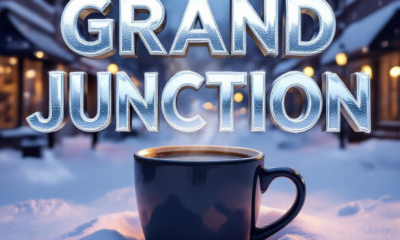A viral, hyper-realistic YouTube thumbnail with a cozy winter blizzard atmosphere. The background is downtown Grand Junction buried in fresh white snow at golden hour with warm coffee shop windows glowing from inside. The composition uses a low-angle cinematic shot to focus on the main subject: a steaming oversized coffee mug placed prominently in thick snow with visible heat waves rising. The image features massive 3D typography with strict hierarchy: The Primary Text reads exactly: 'GRAND JUNCTION'. This text is massive, the largest element in the frame, rendered in icy blue chrome with frosty condensation effects to look like a high-budget 3D render. The Secondary Text reads exactly: 'RECORD SNOW'. This text is significantly smaller, positioned below the main text with a bold red sticker-style outline and subtle falling snow particles over it. The text materials correspond to the story's concept. Crucial Instruction: There is absolutely NO other text, numbers, watermarks, or subtitles in this image other than these two specific lines. 8k, Unreal Engine 5, cinematic render.