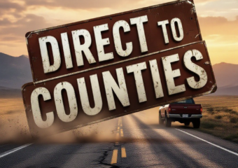 A viral, hyper-realistic YouTube thumbnail with a dramatic rural American atmosphere. The background is a cracked, pothole-riddled county road stretching into the sunset with distant Rocky Mountains, dust kicking up from a passing pickup truck, warm golden hour lighting. The composition uses a low dramatic angle to focus on the main subject: a massive weathered county road sign bent and battered. Image size should be 3:2. The image features massive 3D typography with strict hierarchy: The Primary Text reads exactly: 'DIRECT TO COUNTIES'. This text is massive, the largest element in the frame, rendered in rusted heavy metal with glowing orange edges to look like a high-budget 3D render. The Secondary Text reads exactly: 'H.R. 7437'. This text is significantly smaller, positioned below the main text. It features a thick white border with red outline sticker style to contrast against the background. Make sure text 2 is always different theme, style, effect and border compared to text 1.