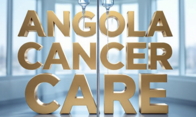 A viral, hyper-realistic YouTube thumbnail with a hopeful medical atmosphere. The background is a bright, modern hospital infusion suite with soft natural light pouring through large windows. The composition uses a low-angle shot to focus on the main subject: a sleek, chrome IV pole standing tall with clear infusion bags gently glowing. Image size should be 3:2. The image features massive 3D typography with strict hierarchy: The Primary Text reads exactly: 'ANGOLA CANCER CARE'. This text is massive, the largest element in the frame, rendered in premium brushed gold with subtle medical blue glow to look like a high-budget 3D render. The Secondary Text reads exactly: 'MAJOR EXPANSION NOW'. This text is significantly smaller, positioned below the main text. It features a thick white border with red outline (sticker style) to contrast against the background. Make sure text 2 is always different theme, style, effect and border compared to text 1.
