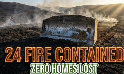 A viral, hyper-realistic YouTube thumbnail with a dramatic wildfire victory atmosphere. The background is a vast charred training area on Fort Carson at golden hour with lingering wisps of smoke rising into a clear Colorado sky with dramatic god rays piercing through. The composition uses a wide, low-angle cinematic shot to focus on the main subject: a massive weathered bulldozer blade covered in fresh dirt pushing the final containment line. Image size should be 3:2. The image features massive 3D typography with strict hierarchy: The Primary Text reads exactly: '24 FIRE CONTAINED'. This text is massive, the largest element in the frame, rendered in glowing ember-orange molten metal with cracking cooled lava texture to look like a high-budget 3D render. The Secondary Text reads exactly: 'ZERO HOMES LOST'. This text is significantly smaller, positioned below the main text. It features a thick white glow border with subtle green victory outline to contrast against the dark landscape. Make sure text 2 is always different theme, style, effect and border compared to text 1.