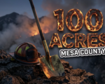 A viral, hyper-realistic YouTube thumbnail with a Crisis News atmosphere. The background is a rugged Colorado mountain landscape near Collbran with smoke billowing into a twilight sky and warm orange glow from distant flames. The composition uses a Low Angle to focus on the main subject: a detailed Faceless Firefighter Helmet resting on a rocky ledge in the foreground. Image size should be 3:2. The image features massive 3D typography with strict hierarchy: The Primary Text reads exactly: '100 ACRES'. This text is massive, the largest element in the frame, rendered in Fire and Ember Texture to look like a high-budget 3D render. The Secondary Text reads exactly: 'MESA COUNTY'. This text is significantly smaller, positioned below the main text. It features a thick, distinct white border/outline (sticker style) to contrast against the background. Make sure text 2 is always different theme, style, effect and border compared to text 1. The text materials correspond to the story's concept. Crucial Instruction: There is absolutely NO other text, numbers, watermarks, or subtitles in this image other than these two specific lines. 8k, Unreal Engine 5, cinematic render.