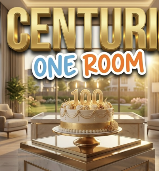 A viral, hyper-realistic YouTube thumbnail with a Lifestyle atmosphere. The background is a sunny, modern senior living lobby with large windows and golden hour lighting. The composition uses a Eye-Level Shot to focus on the main subject: a decorated birthday cake with '100' candles. Image size should be 3:2. The image features massive 3D typography with strict hierarchy: The Primary Text reads exactly: '5 CENTURIES'. This text is massive, the largest element in the frame, rendered in Gold to look like a high-budget 3D render. The Secondary Text reads exactly: 'ONE ROOM'. This text is significantly smaller, positioned below or next to the main text. It features a thick, distinct color border/outline (sticker style) to contrast against the background. Make sure text 2 is always different theme, style, effect and border compared to text 1.