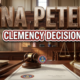 A viral, hyper-realistic YouTube thumbnail with a Government/Legal atmosphere. The background is a Colorado state capitol building interior with dramatic courtroom lighting, featuring rich mahogany wood panels and morning sunlight streaming through tall windows. The composition uses a Low Angle shot to focus on the main subject: a highly detailed wooden judge's gavel resting on an official clemency document with the Colorado state seal visible, surrounded by legal folders and an antique brass scale of justice slightly out of focus in the background. Image size should be 3:2. The image features massive 3D typography with strict hierarchy: The Primary Text reads exactly: 'TINA PETERS'. This text is massive, the largest element in the frame, rendered in Polished Bronze with Marble Veining to look like a high-budget 3D render with dramatic shadows. The Secondary Text reads exactly: 'CLEMENCY DECISION'. This text is significantly smaller, positioned below the main text. It features a thick, distinct red and white border/outline in sticker style to contrast against the background. Make sure text 2 is always different theme, style, effect and border compared to text 1. The text materials correspond to the story's legal and governmental concept. Crucial Instruction: There is absolutely NO other text, numbers, watermarks, or subtitles in this image other than these two specific lines. 8k, Unreal Engine 5, cinematic render